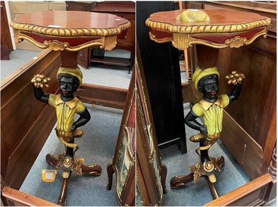 Lot 1354 - A pair of 20th century figural Blackamoore figural stands with gilt decoration the pedestal...