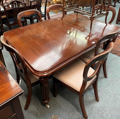 Lot 1356 - A Victorian mahogany wind-out dining table, 146cm (extended) by 103cm by 71cm high and set of...