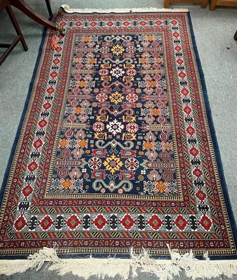Lot 1360 - A good modern Azeri Perepedil design rug, the indigo field with typical rams horn devices...