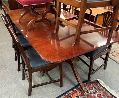 Lot 1361 - A Regency style mahogany twin-pedestal extending dining table with two additional leaves, 203cm...