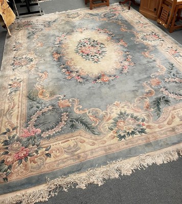Lot 1369 - Carved Chinese carpet, the ice blue field centred by a floral panel framed by ivory borders...