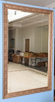 Lot 1371 - A large modern mirror with silvered frame, 107cm by 170cm