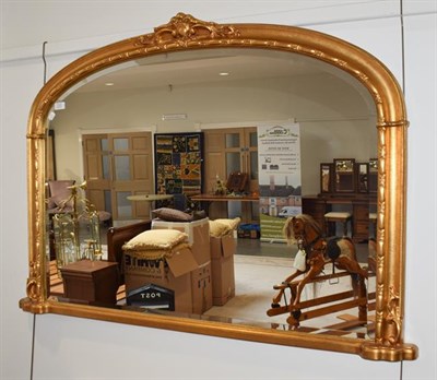Lot 1372 - A gilt framed over-mantel mirror, 133cm by 90cm