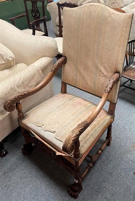 Lot 1379 - A 19th century Continental walnut open armchair