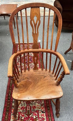 Lot 1381 - An elm Windsor chair with chrinolene structure
