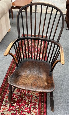 Lot 1382 - A late 19th century yew wood Windsor chair