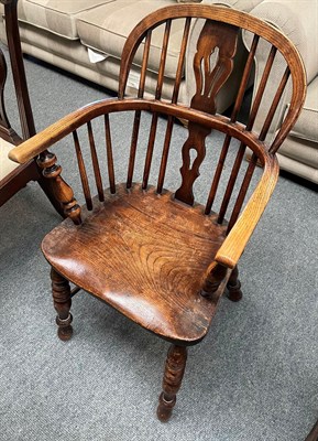 Lot 1383 - A 19th century ash and elm Windsor chair with crinoline stretcher