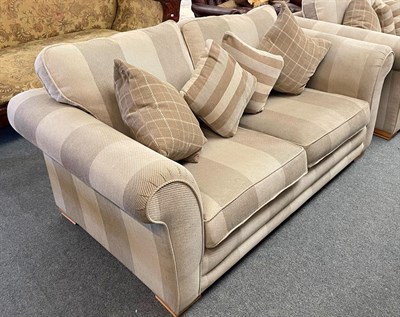 Lot 1385 - A pair of modern three-seater sofas in grey and cream striped upholstery together with a...