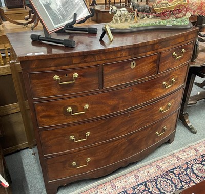 Lot 1394 - A 19th century mahogany bow-front chest, 123cm by 58cm by 106cm