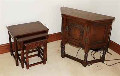 Lot 1397 - A Wood Brothers nest of tables of rectangular graduated form, raised on turned legs with block...