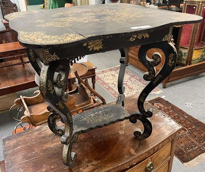 Lot 1410 - A Japanese export black lacquered Pembroke table, circa 1880, lacquered in toned gilt with...