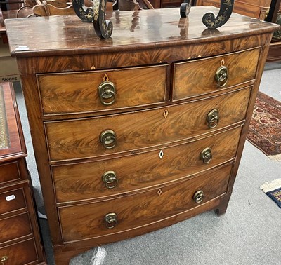 Lot 1411 - A George III mahogany bow front four-height chest of drawers, 104cm by 51cm by 110cm high