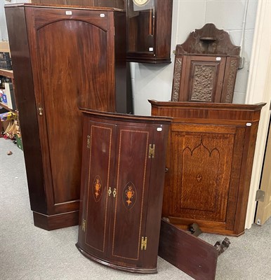 Lot 1423 - A large floorstanding 19th century mahogany corner cupboard, 86cm by 44cm by 175cm, an inlaid...