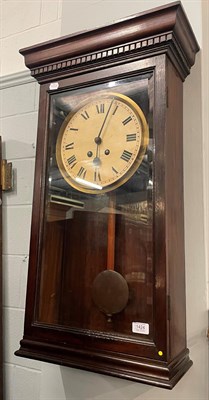 Lot 1424 - An oak cased Gledhill-Brook Time Recorders Ltd wall clock, 83cm together with an oak door (2)