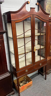 Lot 1433 - An inlaid mahogany display cabinet with broken swan neck pediment, 91cm by 36cm by 187cm