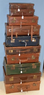 Lot 1133 - Early 20th century suitcases including a brown leather case with lift out tray, leather and...