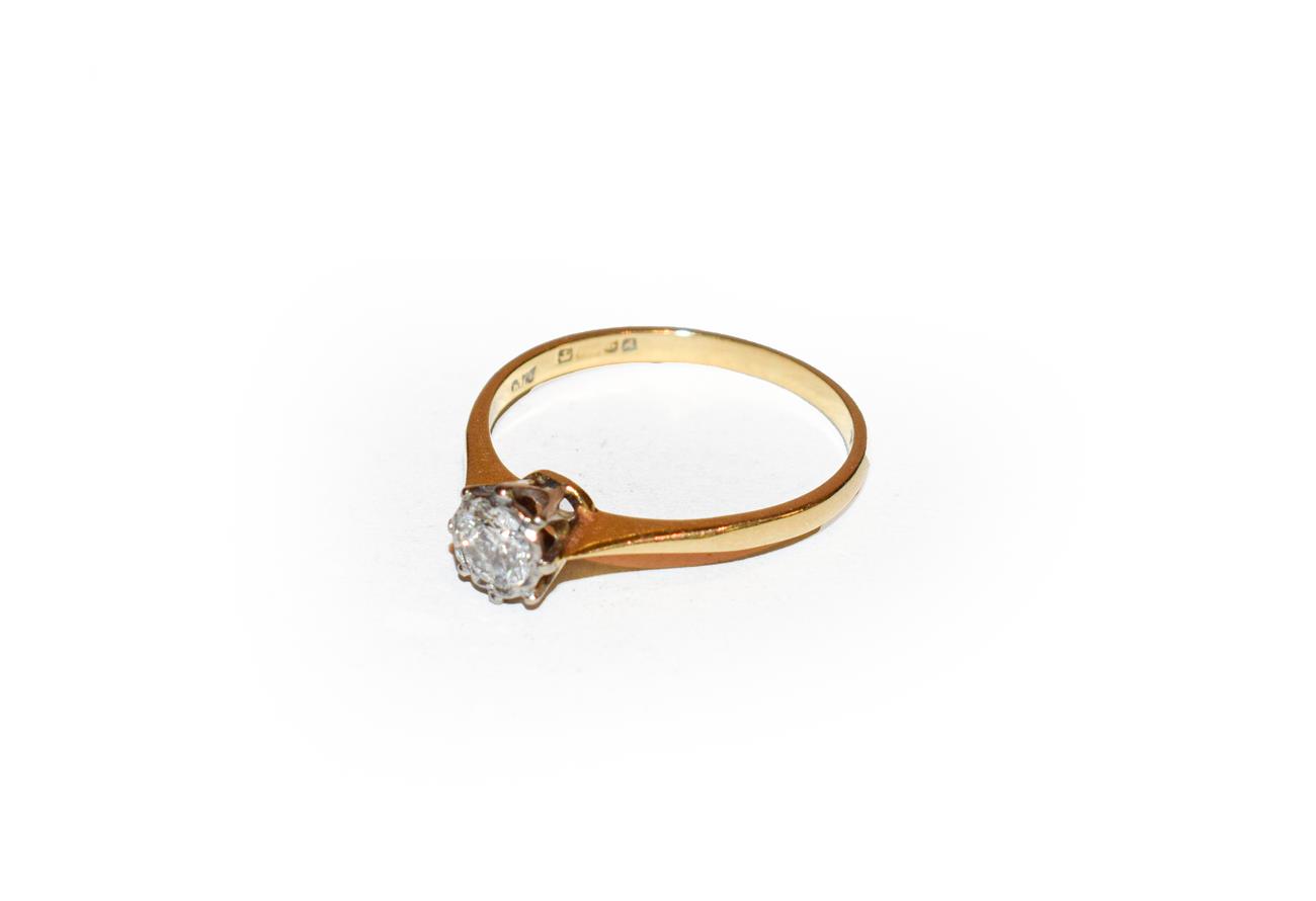 Lot 150 - A diamond solitaire ring, the round brilliant cut diamond in a white claw setting, to a tapered...