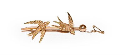 Lot 170 - An Edwardian seed pearl bar brooch, realistically modelled as two swallows in flight, length 5.8cm