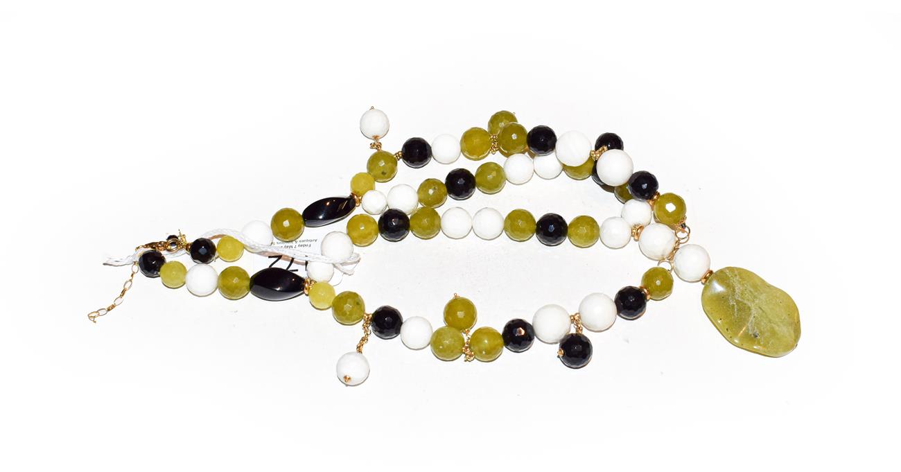 Lot 172 - A jet, agate and glass bead necklace, clasp stamped '750', length 42.5cm