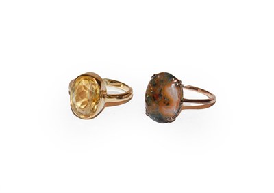 Lot 185 - A moss agate ring, finger size N1/2 and a 9 carat gold citrine ring, finger size M1/2