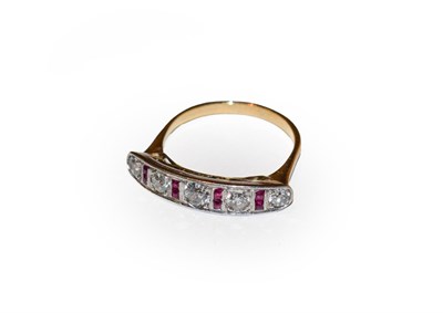 Lot 188 - A ruby and diamond ring, five old cut diamonds spaced by calibré cut rubies in white claw and...