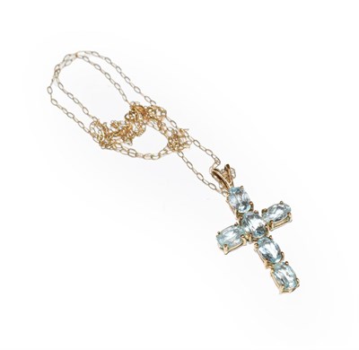 Lot 189 - A blue topaz cross pendant on chain, pendant length 3.0cm, chain length 46cm