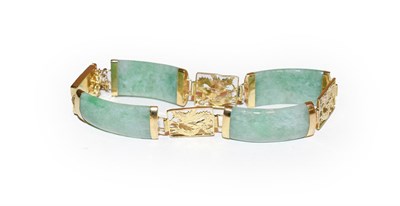 Lot 193 - A 14 carat gold jade type bracelet, length 18cm