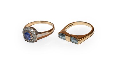 Lot 194 - A 9 carat gold aquamarine ring, finger size L1/2 and a 9 carat gold paste set cluster ring,...