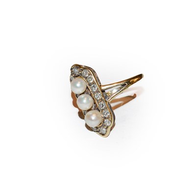 Lot 204 - A 9 carat gold cultured pearl and diamond plaque ring, three cultured pearls positioned up the...