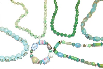 Lot 227 - A jade bead necklace, length 102cm, a jade type necklace, length 84cm and various other blue...