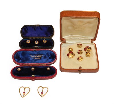 Lot 236 - Three pearl dress studs, cased, three enamel dress studs, cased, a pair of gilt metal cufflinks and