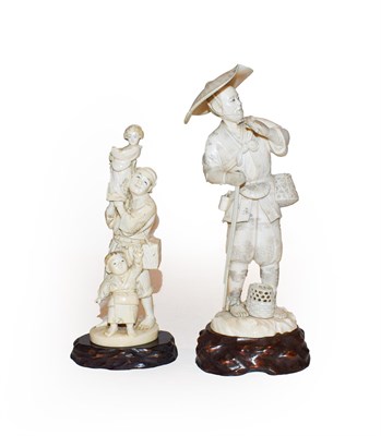 Lot 261 - A Japanese ivory Okimono of a farmer signed at base, Meiji period 20cm high together with...