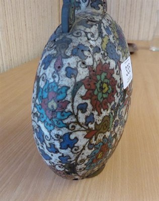 Lot 335 - A 19th century Chinese cloisonne moon flask, twin handled and decorated with stylized flowers...