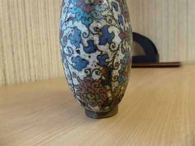 Lot 335 - A 19th century Chinese cloisonne moon flask, twin handled and decorated with stylized flowers...