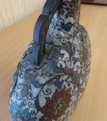 Lot 335 - A 19th century Chinese cloisonne moon flask, twin handled and decorated with stylized flowers...