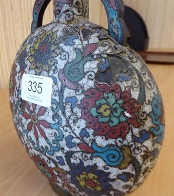 Lot 335 - A 19th century Chinese cloisonne moon flask, twin handled and decorated with stylized flowers...