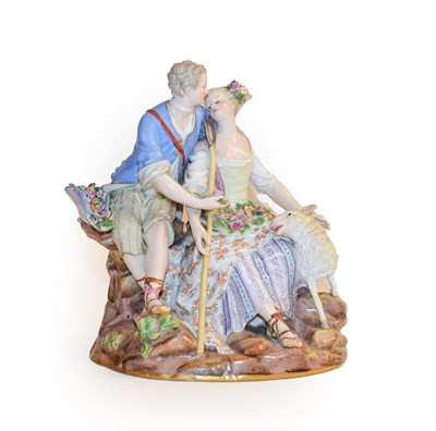 Lot 336 - A Meissen porcelain figure group, circa 1880, as a 18th century lovers sitting on a rocky...