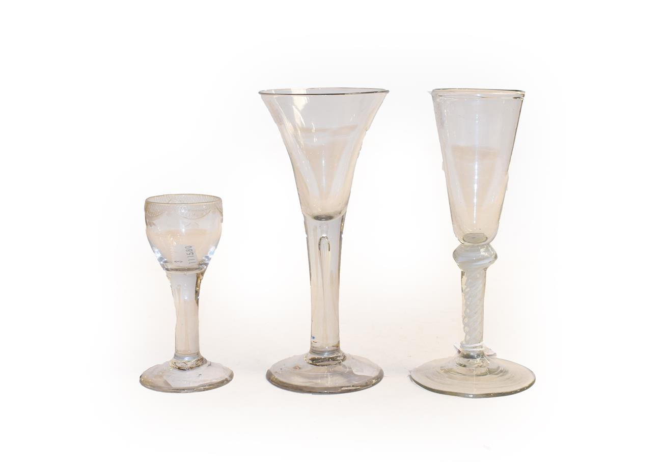 Lot 342 - Three Georgian drinking glasses to include conical shaped wine glass with double-series opaque...