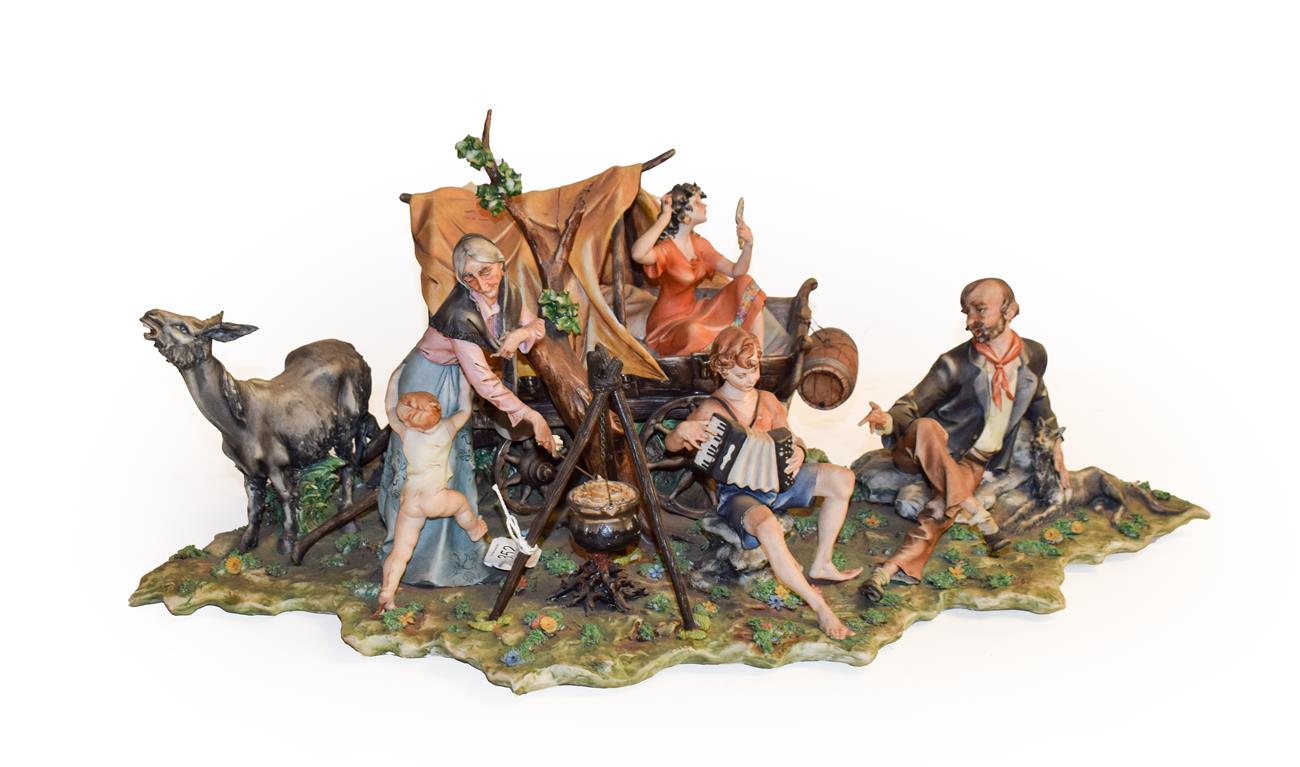 Lot 352 - A Capo di Monet large porcelain figure group ''The Gypsy Encampment'', with scroll certificate