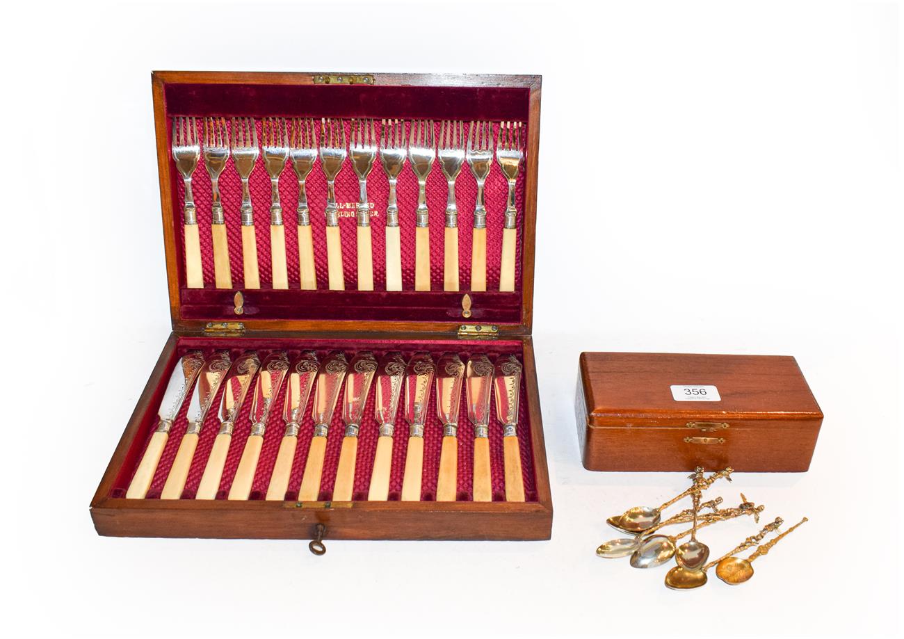 Lot 356 - Case of silver mounted fish eaters, gilt teaspoons and cutlery