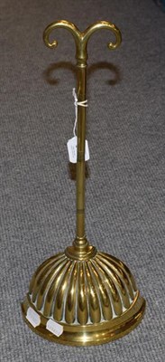 Lot 363 - A 19th century brass doorstop, 43cm high