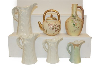 Lot 371 - A Royal Worcester blush ground aesthetic movement kettle, a similar ewer and four palm leaf moulded