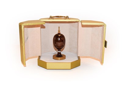 Lot 389 - Theo Faberge Cocobolo wood ''Scribes Egg'' limited edition number 455, St Peterburg collection,...