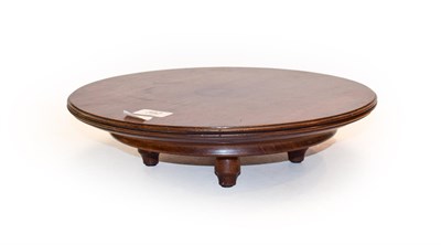 Lot 392 - A 19th century mahogany lazy Susan, 35cm diameter