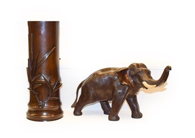 Lot 396 - A Japanese Meiji period bronze elephant with ivory tusks, signed, together with a Japanese...