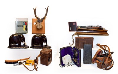 Lot 404 - Two trays containing walnut stereoscopic viewer, a Mars viewer, mounted antlers, cameras and a pair