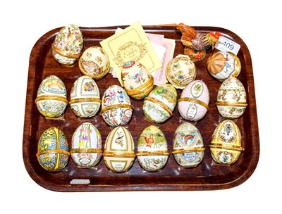 Lot 409 - A quantity of Halcyon Days Bilston & Battersea enamel easter egg boxes, some with certificates (one