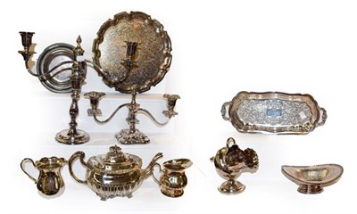 Lot 424 - A quantity of silver plate including trays, candelabra, teapot, etc