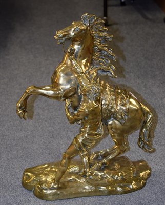 Lot 452 - A large brass Marley horse, 46cm by 60cm