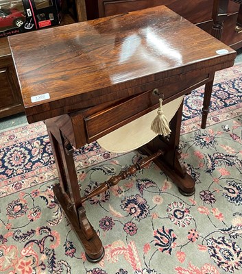 Lot 1392 - A early 19th century rosewood leather insert work table/desk with foldover top and...